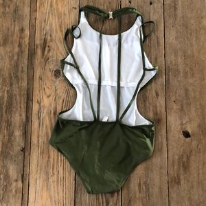 No tag bought at Dillards super cute cutout one piece swim suit size Medium